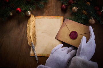 Santa's Letter Writing. A festive scene with parchment, quill, letter,