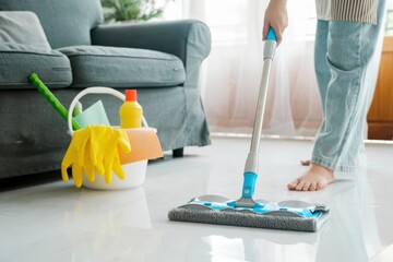 Bright Home Cleaning: Barefoot Person Mops White Floor with Modern Mop and Colorful Supplies