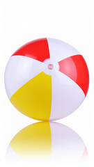 Colorful beach ball on white background with reflective surface background balloon holiday playful summer scene with bright red yellow and white panels evoking fun and relaxation