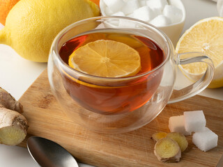 A warming glass of tea with a slice of lemon and ginger. Perfect for autumn and winter evenings.