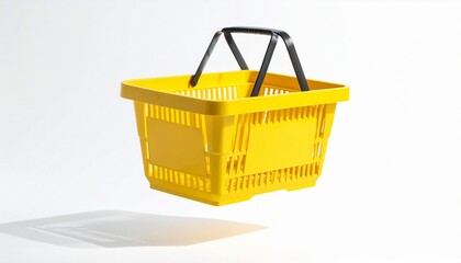 Fototapeta premium Yellow shopping basket in air on white background
