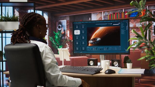 Woman using AI program turning text prompt into videos, pleased by results. Person surrounded by plants interacting with text to video artificial intelligence generative model, camera A