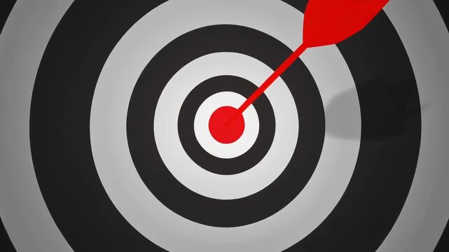 Red arrow hitting center of bullseye target. 3D animation of dartboard focusing on goal. Concept of marketing strategy, accuracy, and business achievement.