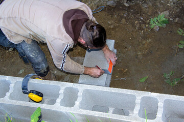 Measuring the brick stones