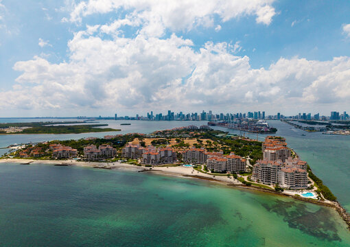 Miami cityscape with skyscrapers and ocean. Miami Beach from above. Miami skyline from top. - Powered by Adobe