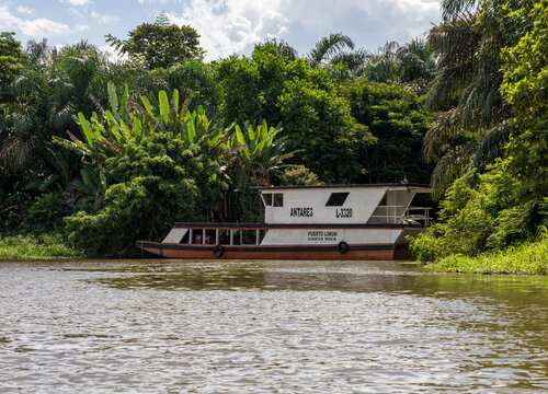 Tortuguero, Costa Rica - 8 November 2025: Antares freight riverboat used for transporting goods on canal system