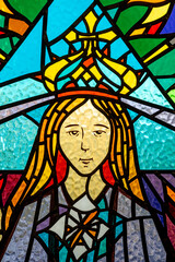 Stained glass window with religious motifs in the church of S&atilde;o Domingos de Benfica. Lisbon-Portugal.