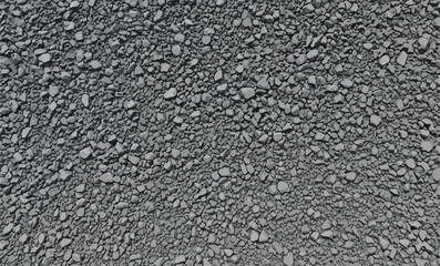 Dark Gray Crushed Rock and Fine Gravel Aggregate Texture Background