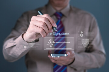 Electronic signature and digital identity security concept with businessman using stylus to sign e-documents on mobile