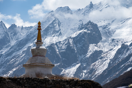 Tibetan Buddhist stupa on the way to Kyangjin Kharka village in Langtang National park in Nepal. The Langtang Valley is mainly inhabited by the Tamang people they mainly follow Tibetan Buddhism.