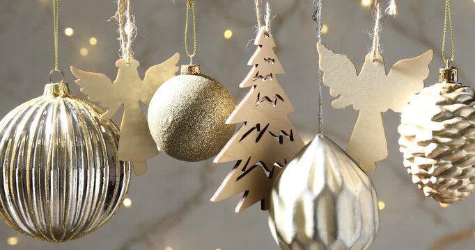 Beautiful Christmas decor hanging on string against blurred lights, closeup