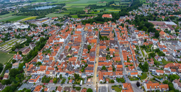 Aerial panorama view of the old town and city Friedberg in Germany, Bavaria on a sunny noon spring day