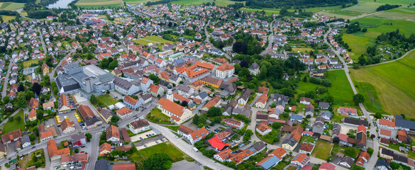 Aerial panorama view of the old town and city Zusmarshausen in Germany, Bavaria on a sunny noon spring day