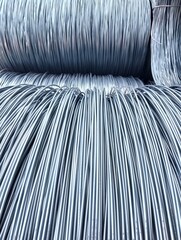 Close up photo of a roll of wire rod material in the cable industry