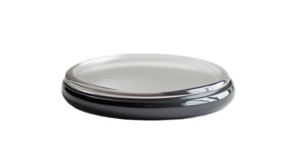 Close up of a sleek modern black and silver container against a studio shot