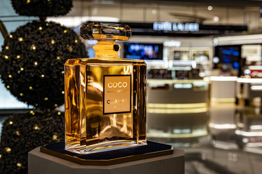 Incheon \ South Korea - 15 November 2025: Oversized display bottle of Coco Mademoiselle by Chanel on a pedestal in an airport duty-free cosmetics area