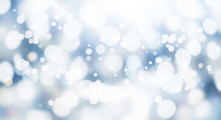 Fototapeta premium Abstract background of bright white and light blue bokeh light circles creating a soft, dreamy, and festive holiday or winter atmosphere with a gentle glow and blurred effect