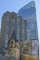 Obraz premium St. Andrew's Presbyterian Church, residential apartment building, and TD Terrace, or looking southeast from King St W to Simcoe St, Toronto