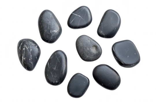 A collection of smooth. polished black stones arranged artistically on a white background. their unique shapes and textures. ideal for use in design or wellness contexts