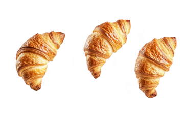 Three freshly baked golden croissants arranged artistically on a clean white background. their flaky texture and inviting appearance. perfect for culinary presentations or food blogs