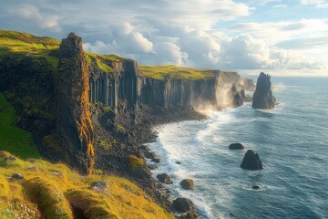 Scenic coastal landscape with dramatic basalt rock cliffs and green grassy terrain during a sunny day with crashing ocean waves and cloudy sky