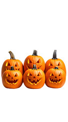 Carved jack-o'-lantern pumpkins glow on a dark background