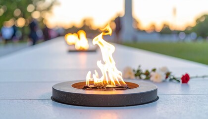 Honor Flame Ceremony for Veterans Day,A symbolic flame is lit at a monument to commemorate and honor the bravery and sacrifice of veterans.