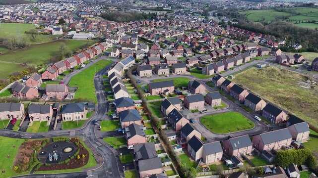 Aerial video of Residential homes in Larne Town Co Antrim Northern Ireland