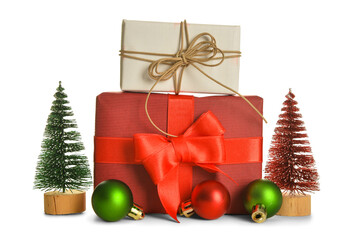 Gift boxes with bows, Christmas trees and balls on white background