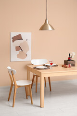 Served dining table with wine and glasses in stylish room