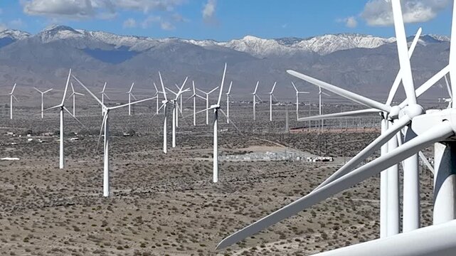 Wind Farm Turbines at San Gorgonio Pass near Palm Springs, California - Drone Pan Right