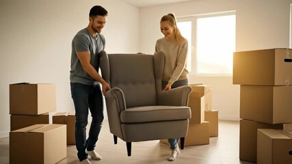Young couple joyfully arranging living room furniture with cardboard boxes in sunlit new home