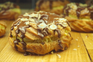 Chocolate-nut pastry on a wooden table