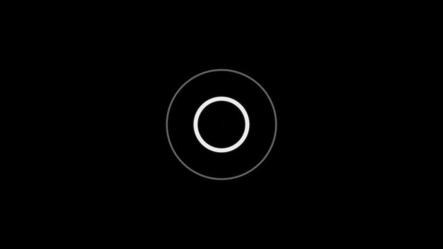 White Ring with Central Dot on Black Background Keywords: circle, ring, geometric, abstract, simple, minimalist, outline, shape, design, graphic, symbol, round, pattern, clean, modern, dark