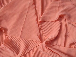 background and pattern of plain pink fabric with striped motif