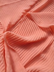background and pattern of plain pink fabric with striped motif