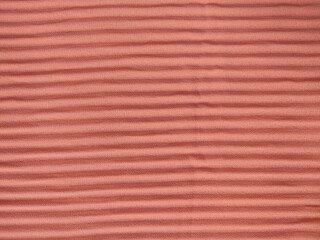 background and pattern of plain pink fabric with striped motif