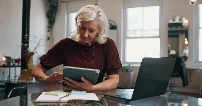 Woman, tablet and salon manager with scroll, laptop and checklist with notes, contact or online shopping. Mature person, tech and click on app, computer or typing for appointment schedule at parlor