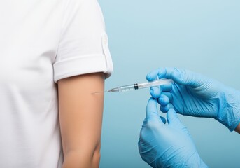 Healthcare professional administering vaccine injection to patient arm