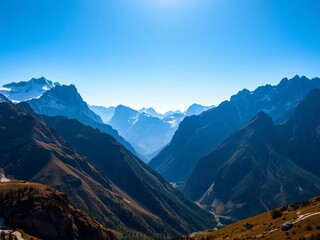 Vast mountain range under a clear blue sky, epic natural beauty, nature, landscape