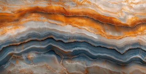 Obraz premium Close-up view of multicolored natural stone layers with swirling patterns in shades of orange, blue, gray, and white creating a textured abstract design