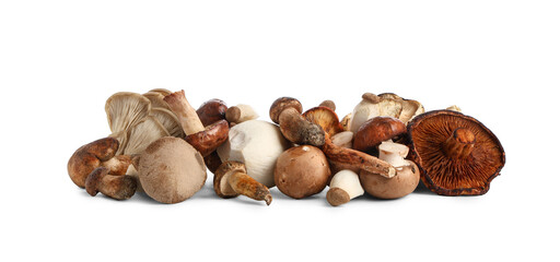 Heap of different fresh mushrooms on white background