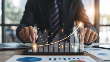 Business professional interacts with a glowing digital projection showing increasing financial performance data