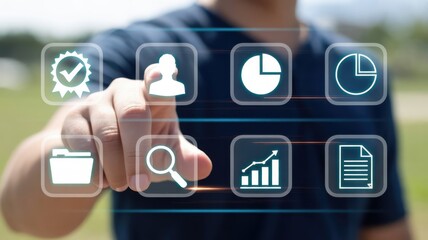 Person interacts with digital interface displaying assorted business and data management icons outdoors