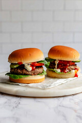 A delicious, tasty cheeseburger with sesame bun, lettuce, tomato, onion, and melted cheese