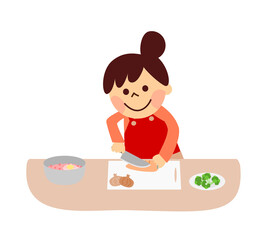 野菜を切る女性