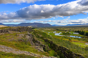 Thingvellir National Park Wide vista of the tectonic rift valley, river, and historic site in &THORN;ingvellir Iceland