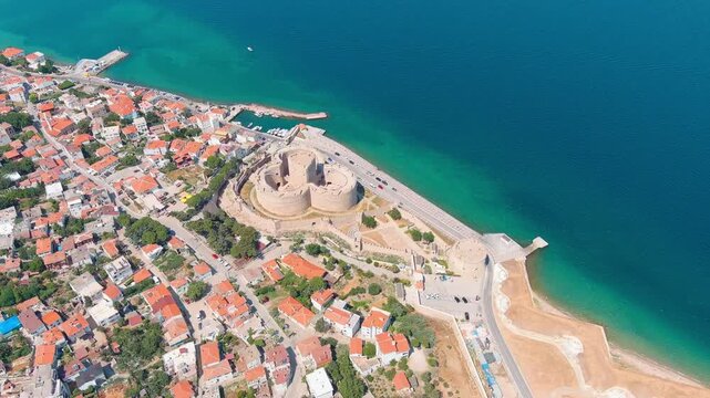 Canakkale, Turkey. Panoramic aerial view of the city on the Asian shore of the Dardanelles Strait, a vibrant Turkish port with ferry terminals and waterfront promenade on a sunny day. Aerial view