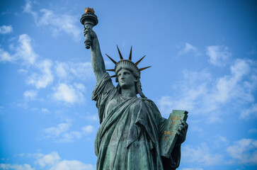 Fototapeta premium Statue of Liberty in Tokyo, a gift from France to Japan, famous landmark for tourists, shot from close distance