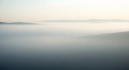 Fototapeta premium Serene Landscape Peaks Emerging from a Sea of Mist and Fog